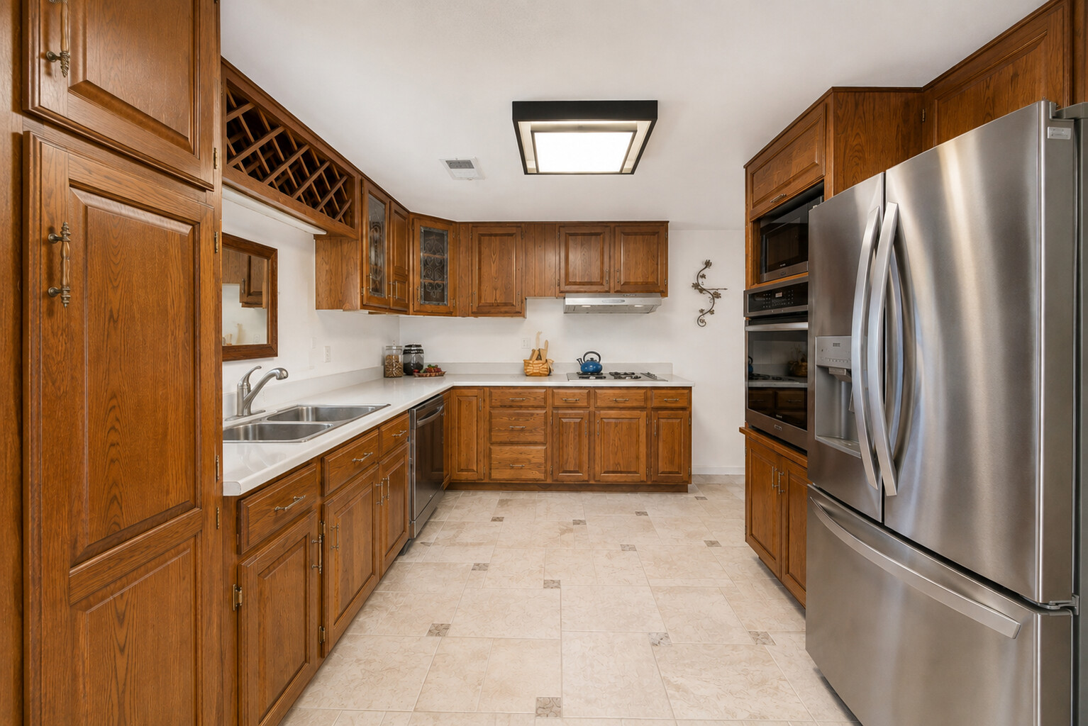 The same kitchen previewed with refreshed surfaces and fixtures
